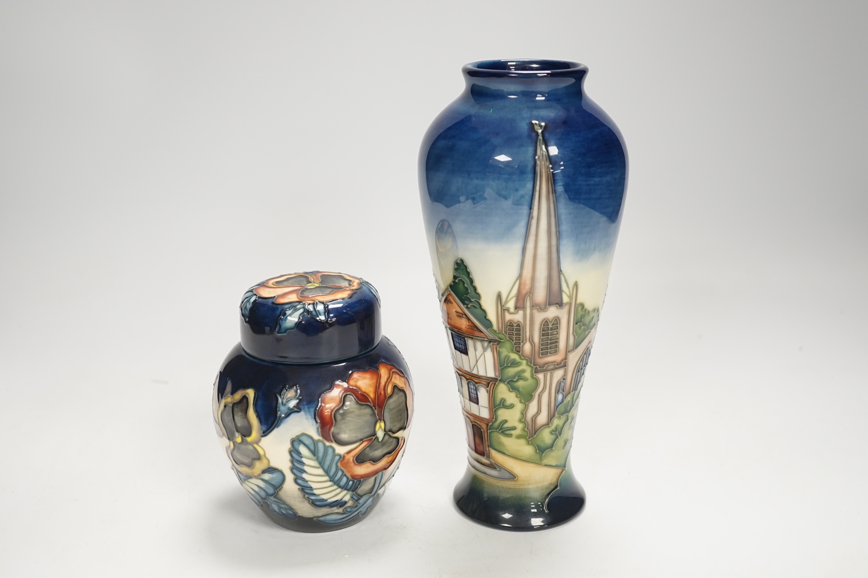 A Moorcroft Pansy ginger jar by Sally Guy, limited edition 18/100 and a Moorcroft ‘Thaxted’ limited edition vase by Philip Gibson, 123/200, largest 20cm high